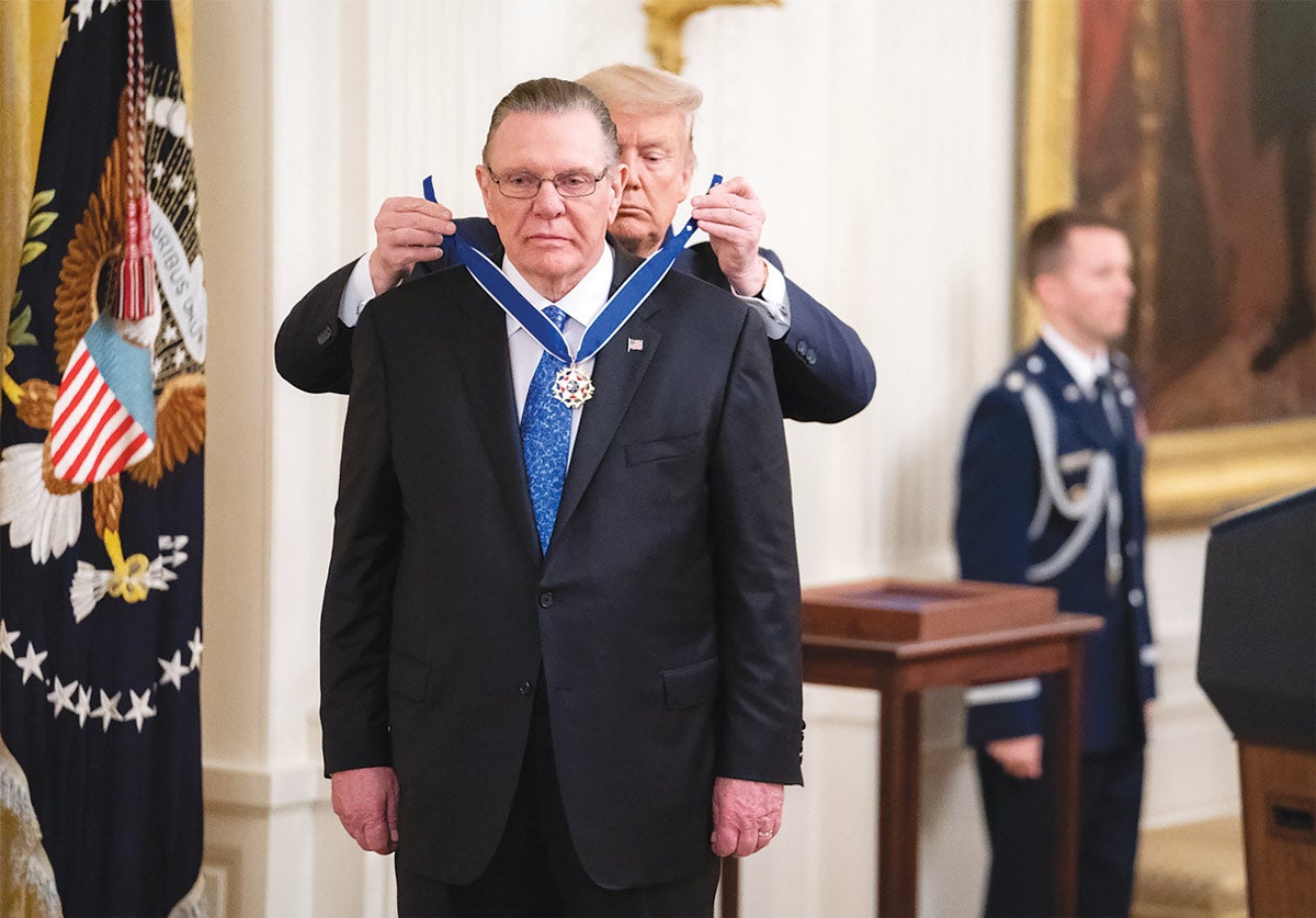 President Donald Trump presents the 
Presidential Medal of Freedom to retired Army Gen. Jack Keane during a ceremony at the White House, March 10, 2020.